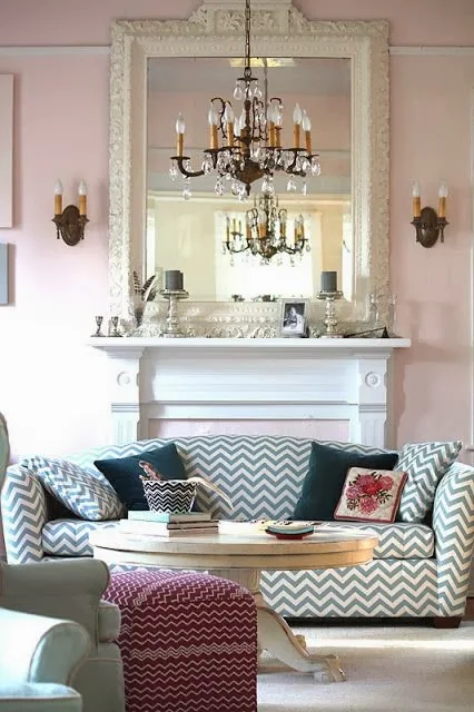 dusty pink walls with chevron sofa