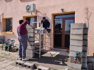 Sally up on a scaffold