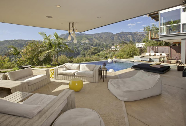 Photo of closed terrace with the pool and hills views