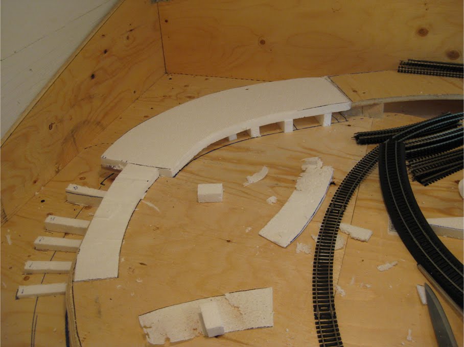 A track riser made of expanded foam leading from one elevation of benchwork to another
