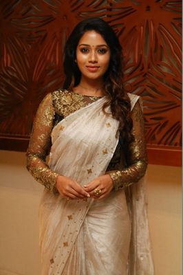 Nivetha Pethuraj wearing full sleeve designer blouse