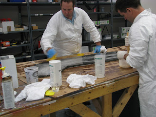 Spreading thickened epoxy on outside laminate side of core