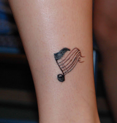 music notes tattoos. musical notes tattoos