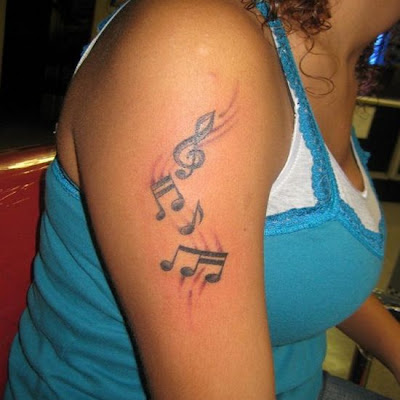 Music Tattoo Designs This is a best tattoos design and that is very nice no 