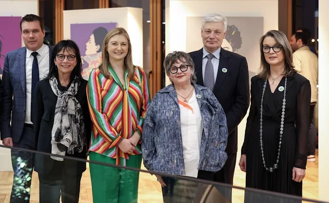 Princess Stephanie wore a rainbow chevron print silk blouse by Valentino Garavani, and green pants