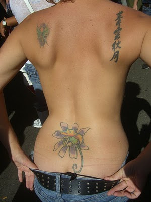 Flower Tattoo on Lower Back Female