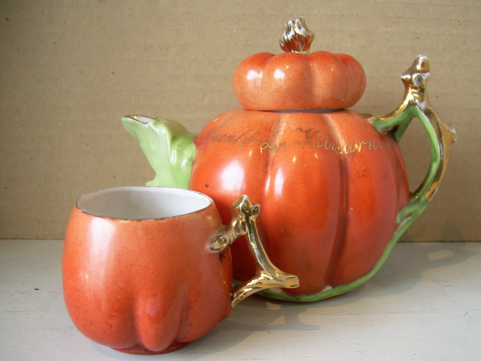 teapot in the form of a pumpkin, with a 'Present from Kilmarnock ...