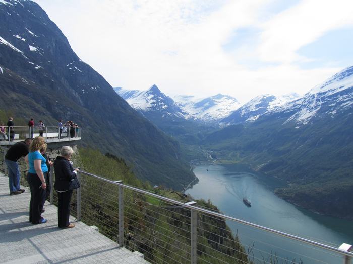 The Geirangerfjorden is a fjord in the Sunnmøre region of Møre og Romsdal county, Norway. It located entirely in Stranda Municipality. It is a 15-kilometre (9.3 mi) long branch off of the Sunnylvsfjorden, which is a branch off of the Storfjorden (Great Fjord). The small village of Geiranger is located at the end of the fjord where the Geirangelva river empties into it.