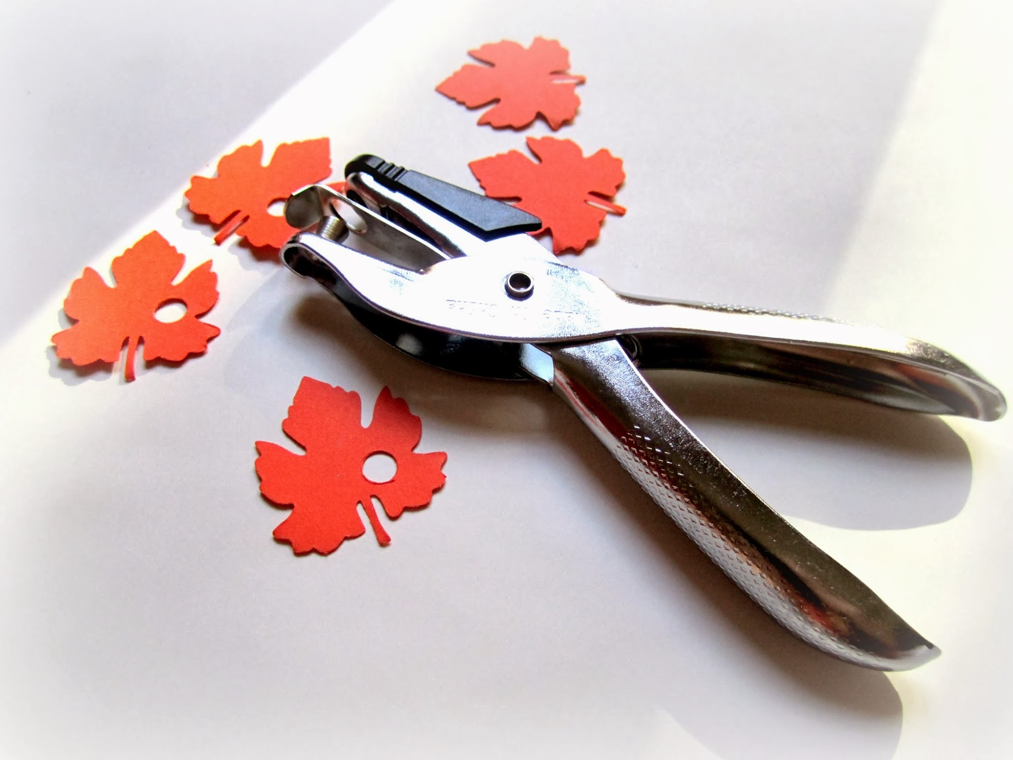 paper leaf hole punch