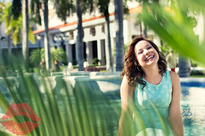 laughing girl between plants, besame mucho photography, at playa del carmen