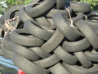 Tires loaded in pickup, La Ceiba, Honduras