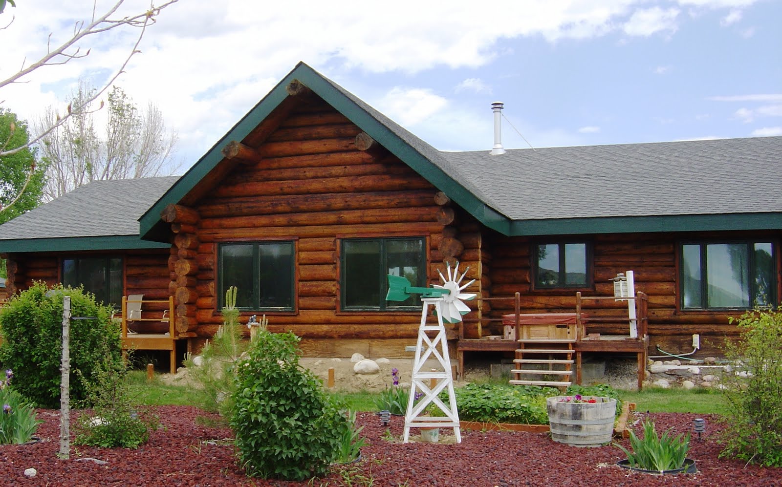 Log and Wood Siding Care: One TIME Wood Protector on Log Home