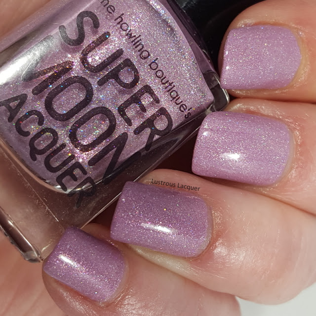 pale lilac nail polish with holographic flakes