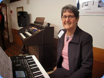 Ann Izzillo preparing to play her Korg Pa3X. Photo courtesy of Dennis Lyons