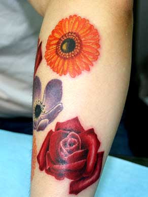 Feminine Flower Tattoo Design on Hand