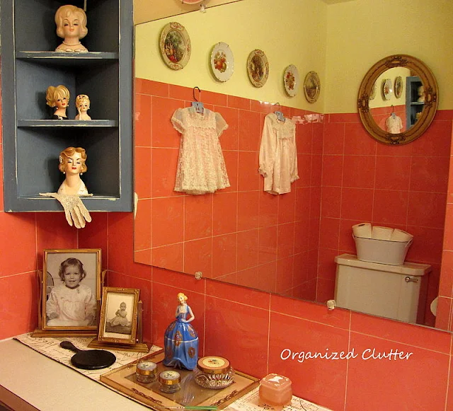 Headvases, vanity jars in a vintage bathroom