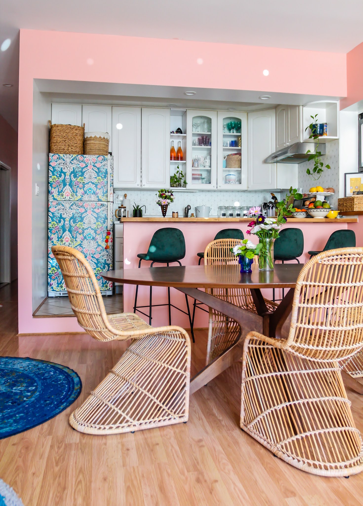 pink and green decor // green barstools // pink kitchen // diy wallpaper fridge // pink and green kitchen // colorful homes // Megan Zietz  Apartment // TfDiaries // pink and green room // pink and green Inspo // barstool inspo //rattan s chairs // mid century modern decor