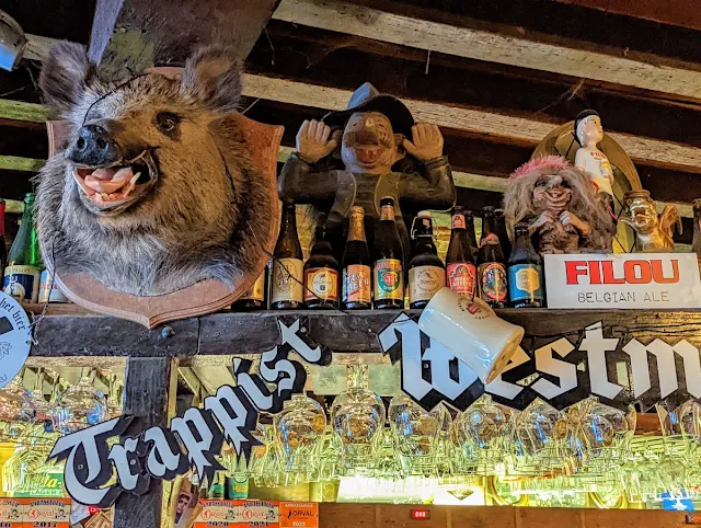 Ghent in One Day: Boar's Head and Beer bottles at Trollekelder