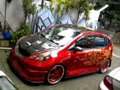 modifikasi mobil Honda all new jazz rs merah