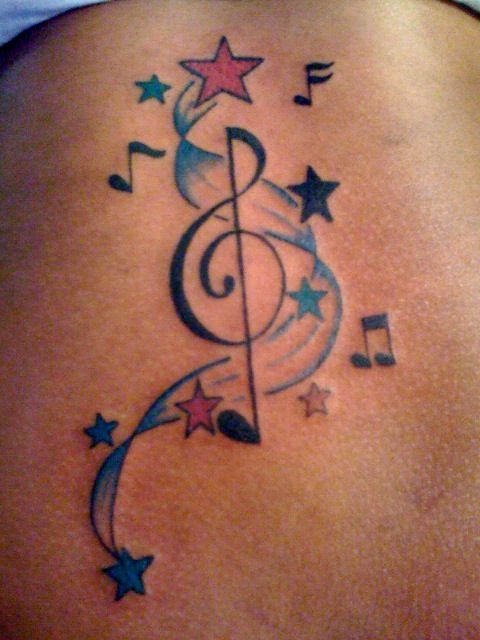 Stars and music notes on my calf Yes similar design I think
