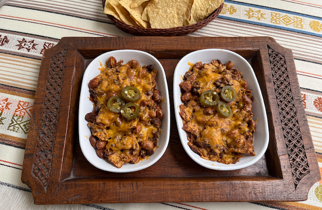 Food Lust People Love: Sort of a precursor to nachos, chili-fritoque is a great appetizer made with broken tortilla chips, chili con carne and pinto beans, topped with cheese and jalapeños.