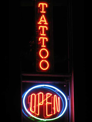 Another Triangle Tattoo sign