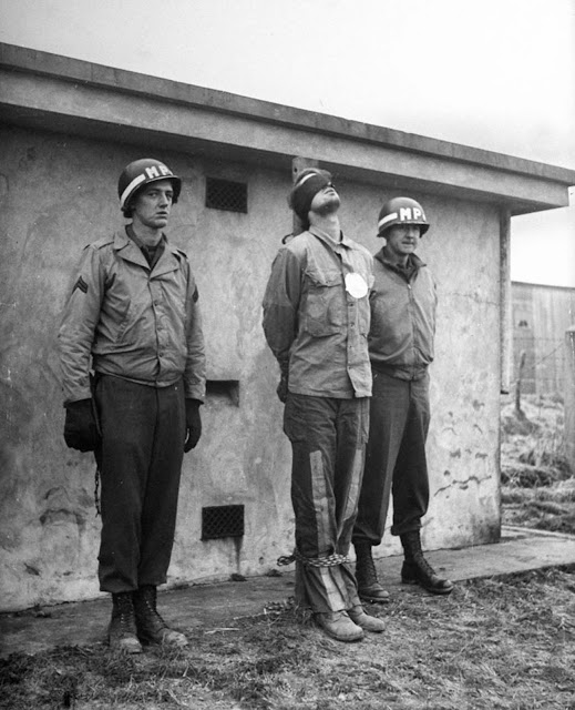 The prisoners refused the ministrations of a U.S. chaplain. They kept their nerve by singing patriotic German songs.