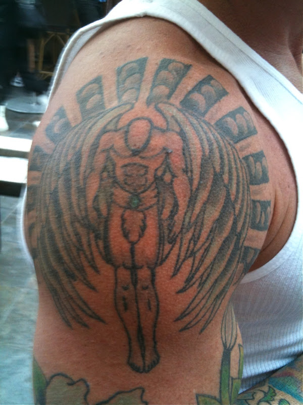 Muscle tattoo angel Meanwhile in addition to street art I also spied this 
