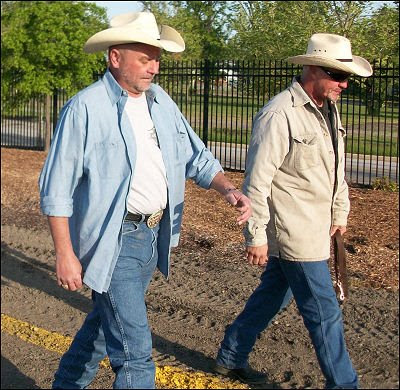 wearing their cowboy hats