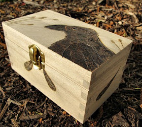 woodburned box with image of a crow