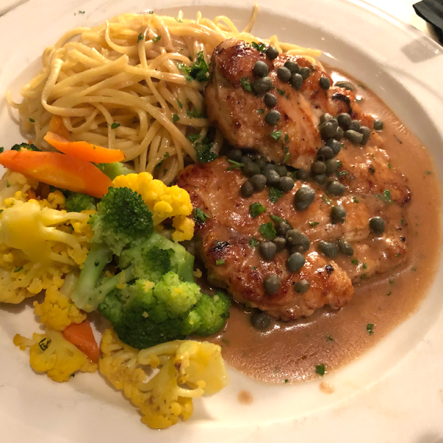 Chicken Piccata with vibrant vegetable medley at Palm Court in Arlington Heights