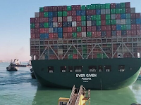 Massive container ship blocking Suez Canal freed, partially afloat