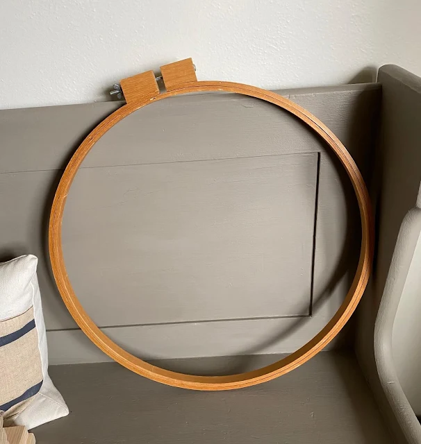 Photo of a large wooden quilting hoop