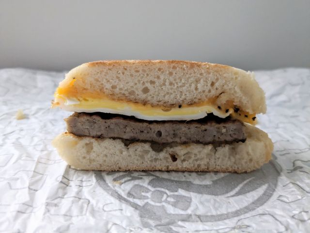 Wendy's Sausage, Egg & Cheese English Muffin cross-section.
