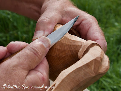 Carving the planking on a dragon Kuksa