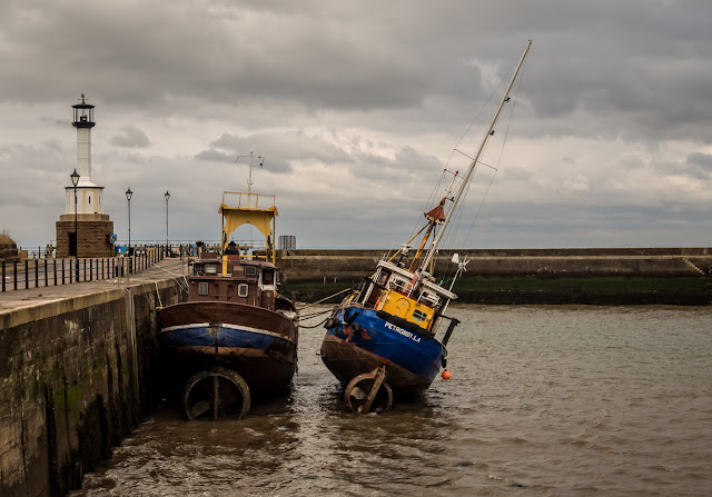 Photo of Petronella alongside Samenwerking before towing the former trawler to Scotland