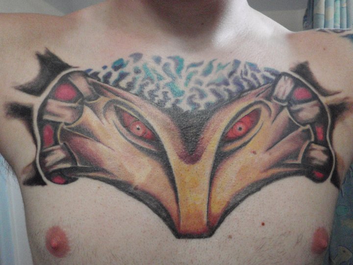  fans but this guy goes above and beyond with his massive chest tattoo