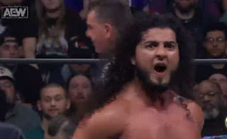 Rush y Mark Briscoe en AEW Dynamite.