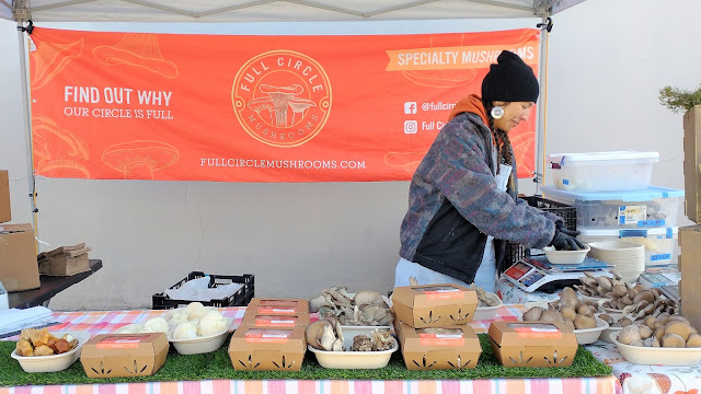 Mushrooms and brilliant smile at Las Cruces Farmers and Crafts Market. December 2022. Credit: Mzuriana.