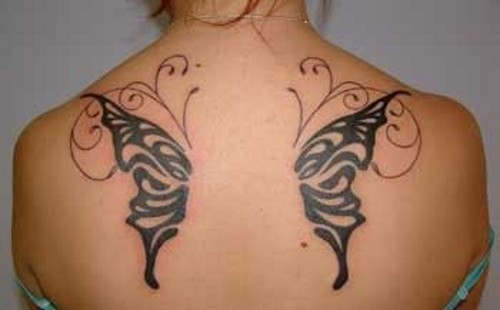 black and white butterfly tattoos. utterfly tattoo lower back.