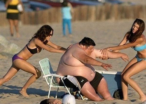 fat guy on bike pic. Fat Guy on a Beach Fail