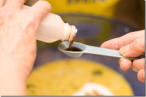 pouring vanilla extract