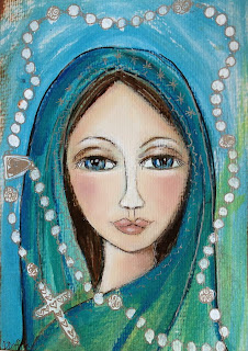 http://fineartamerica.com/featured/mary-with-white-rosary-beads-denise-daffara.html