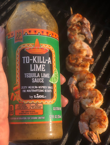 Tequila lime sauce next to grilled shrimp