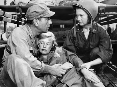 Humphrey Bogart, June Allyson y Perry Sheehan en Campo de batalla (1953)