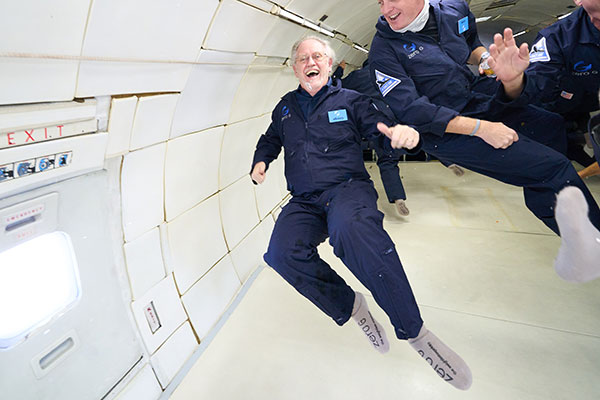 Resident Astronomer George goes after a floating ball of water (Source: The Zero-G Team)