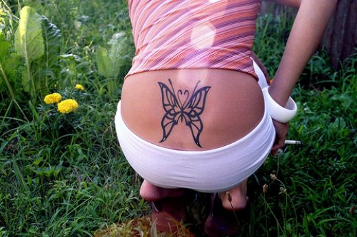 Butterfly lower back tattoo is one