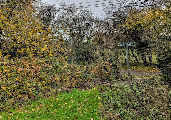 Cross the footbridge then turn left and head E on Rushden Road