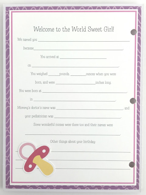 Baby Girl Scrapbook Journal Album with a journaling page and a pacifier