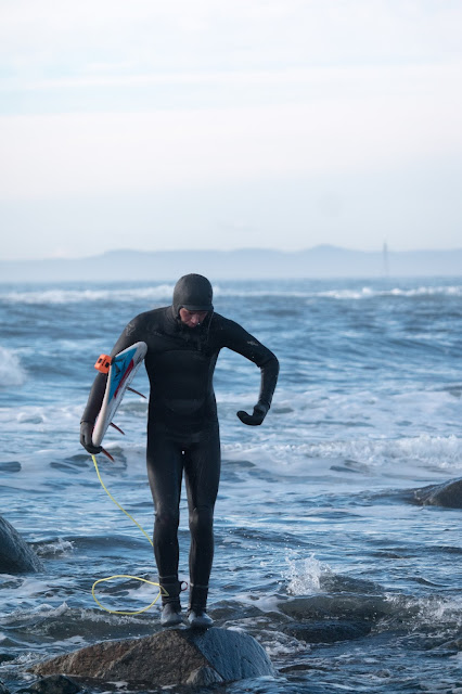 Surfing on a cold winterday in Norway